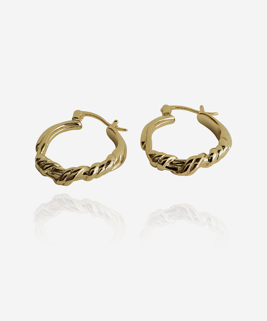 Bond gold plated earrings on white background
