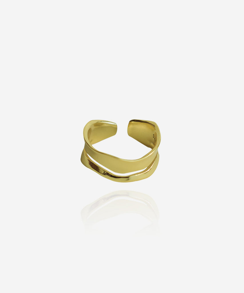 Halara gold plated ring on white backgound