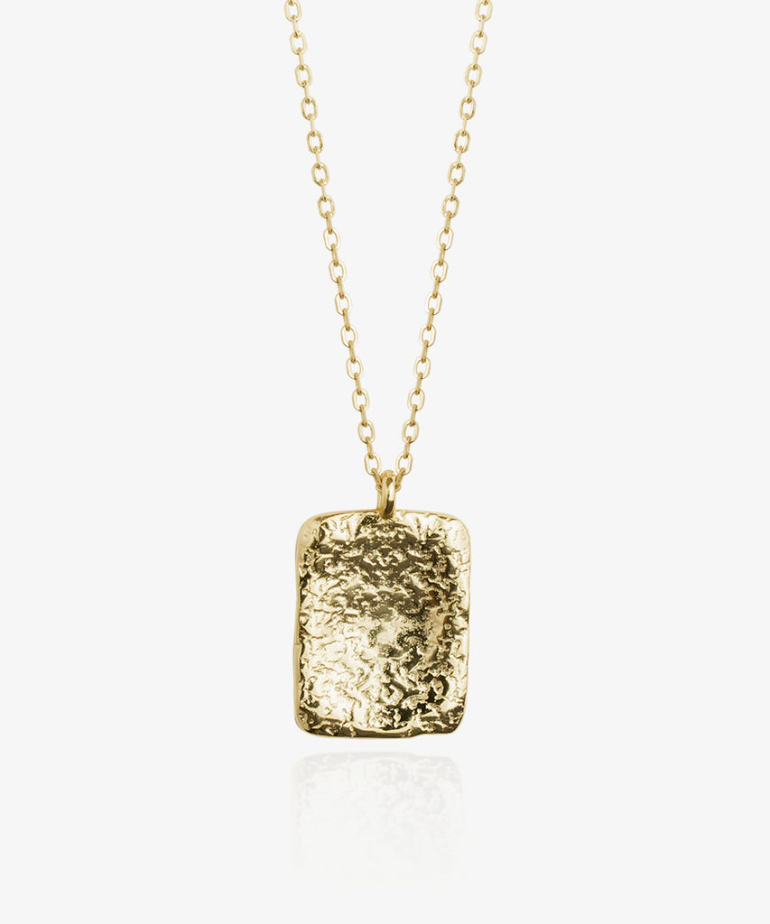 Gold plated natural looking Goldy necklace on white background
