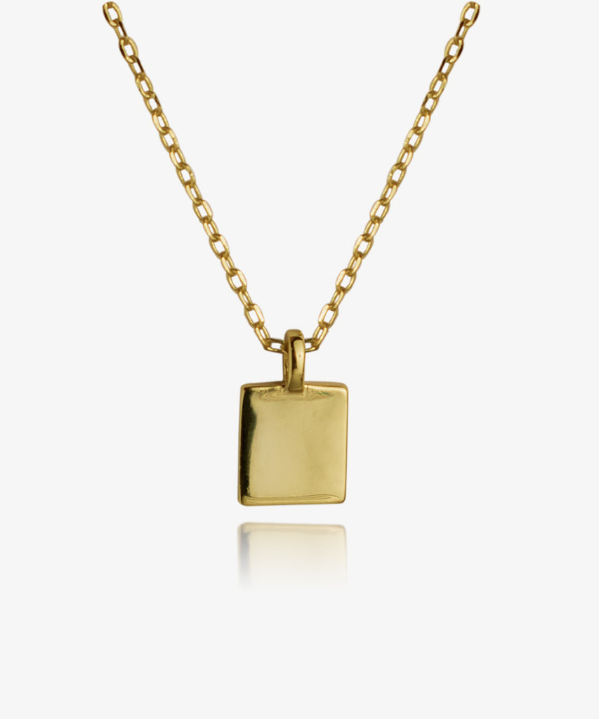 Stunning petite Minimal gold necklace on white background